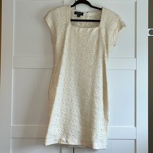 Gillian beautiful ivory colored lace dress with matching liner.